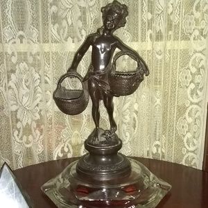 AN HEAVY BASKET BRONZE SCULPTURE BY AUGUSTE MOREAU